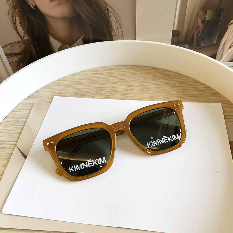 KIMHEKIM Vintage Pumpkin Polarized Letter Sunglasses